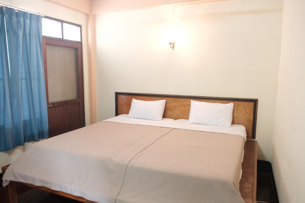 Manilath Guesthouse Ban Houayxay Quarto foto