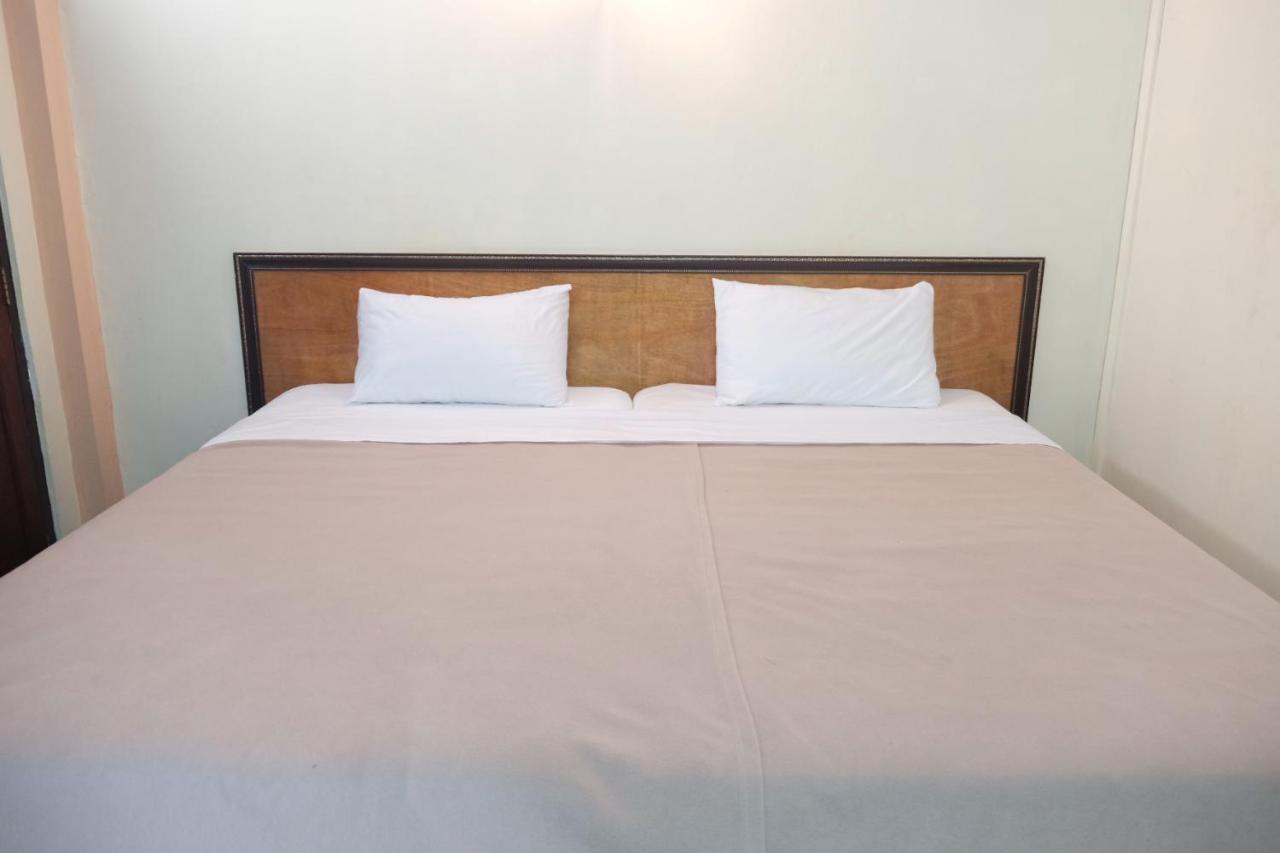 Manilath Guesthouse Ban Houayxay Quarto foto