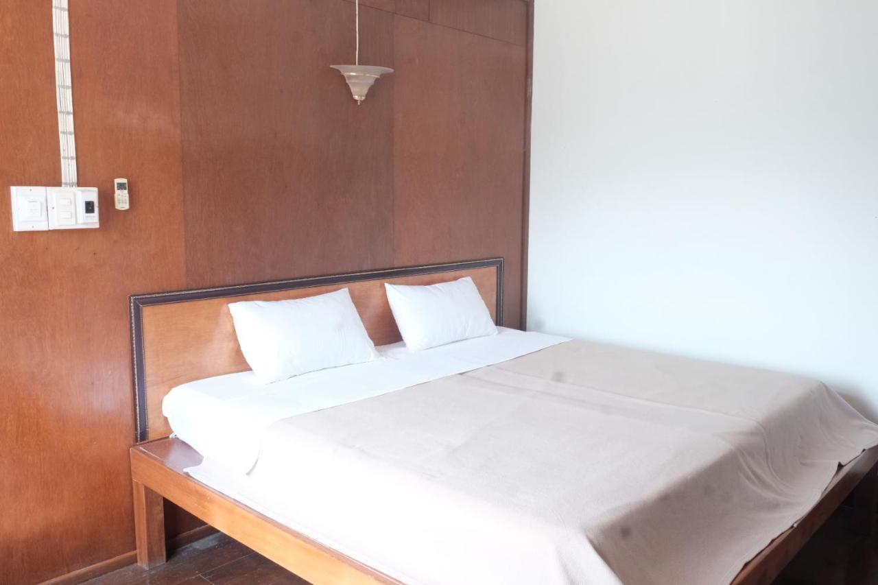 Manilath Guesthouse Ban Houayxay Quarto foto