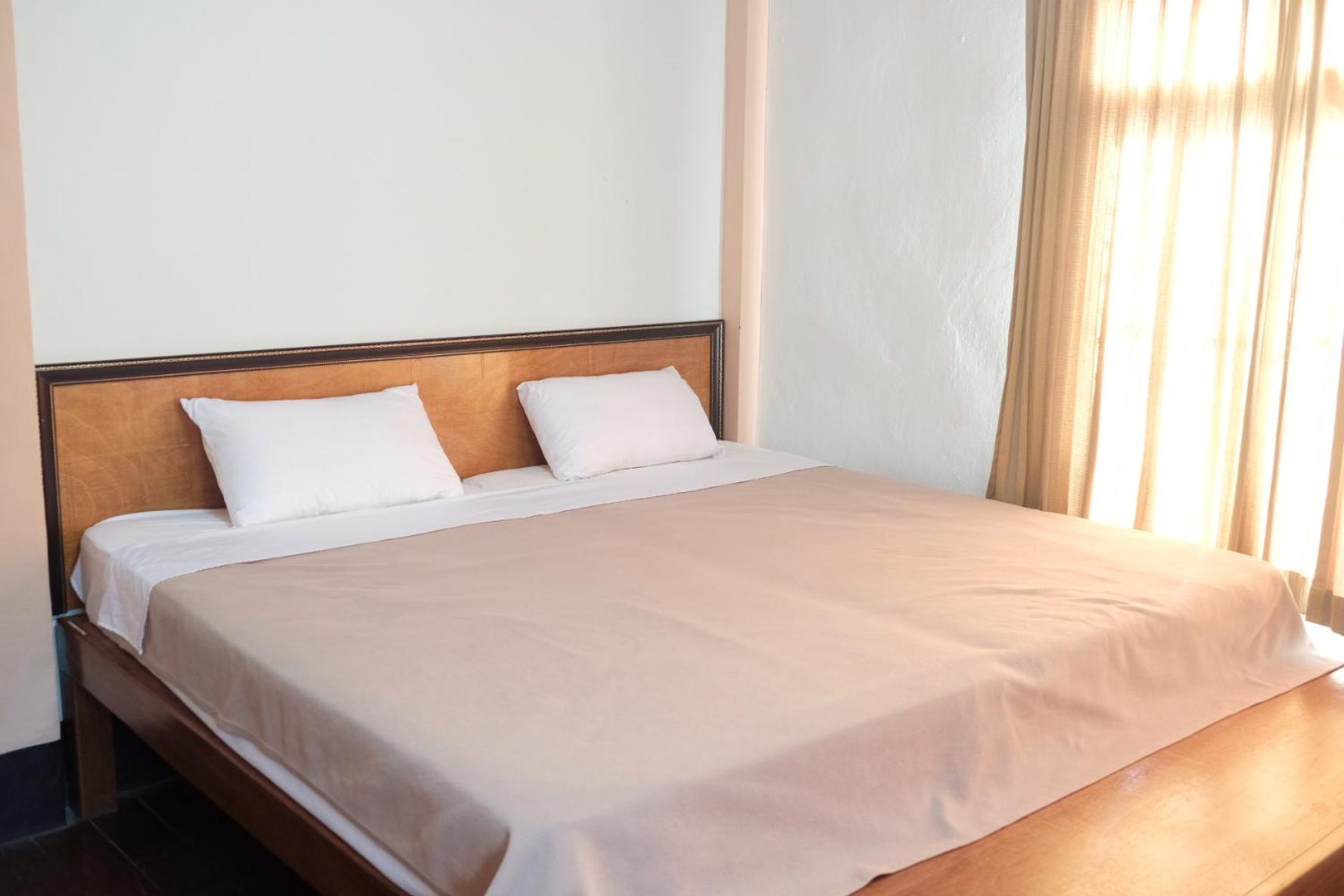 Manilath Guesthouse Ban Houayxay Quarto foto